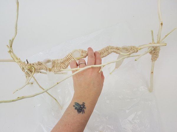 Press down on the armature to make sure it can carry the flowers Press down on the armature to make sure it can carry the flowers