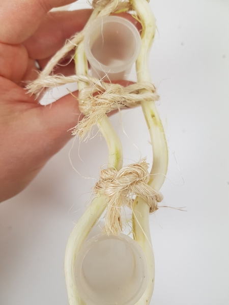 Space out the water tubes and tie it temporarily in place with a knot on both sides Space out the water tubes and tie it temporarily in place with a knot on both sides