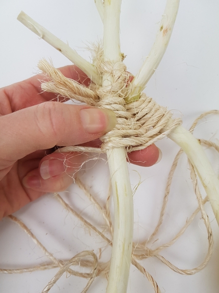Wrap the twigs from the outside over and inside under Wrap the twigs from the outside over and inside under