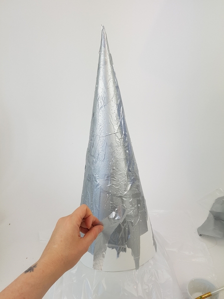 Cover the entire shape with glue and paper Cover the entire shape with glue and paper