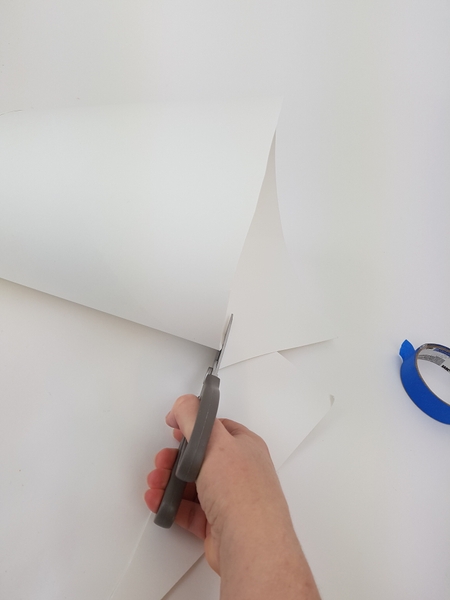 Cut the wide open end of the cone flat Cut the wide open end of the cone flat