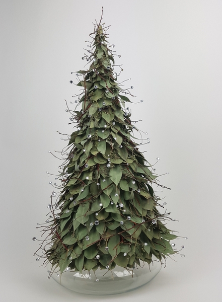 Eucalyptus leaf and crystal Christmas tree flower arrangement Eucalyptus leaf and crystal Christmas tree flower arrangement