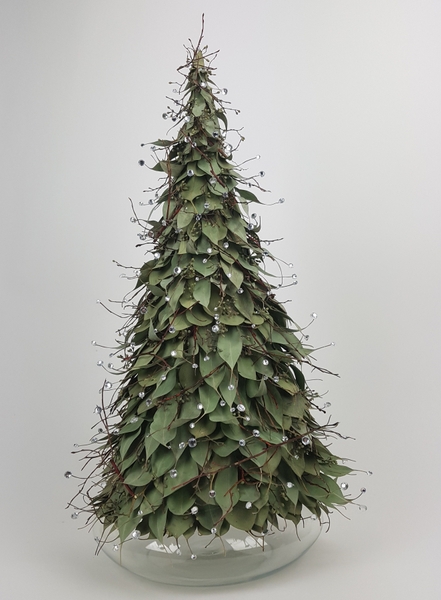 Eucalyptus leaf and crystal Christmas tree flower arrangement