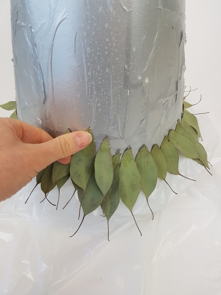 Once done with the first row start a second row of leaves. Once done with the first row start a second row of leaves.