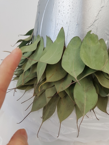 Place the leaves so that they curve up slightly to avoid it looking like it is droopy Place the leaves so that they curve up slightly to avoid it looking like it is droopy