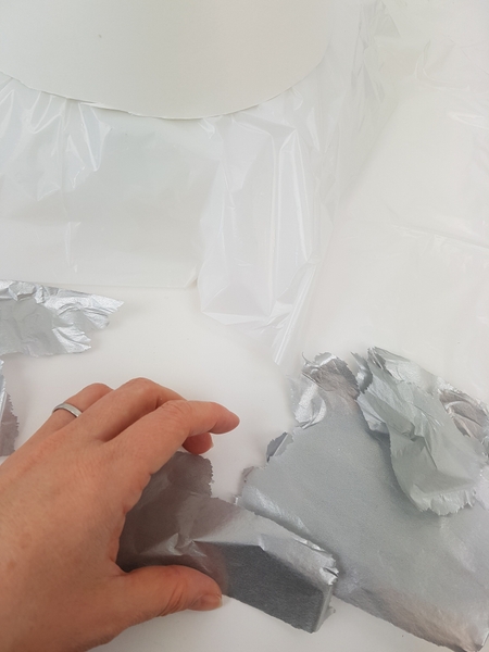 Rip up silver tissue paper Rip up silver tissue paper