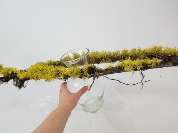 Wiggle the vase so that the branches settle into position Wiggle the vase so that the branches settle into position