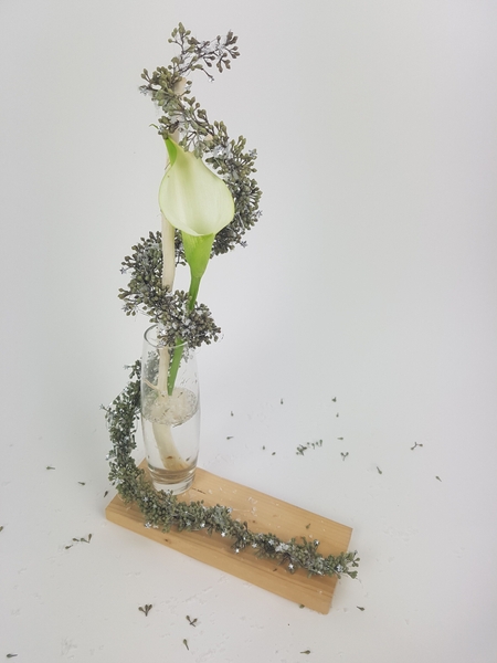 Eucalyptus tinsel garland with an arum lily floral design