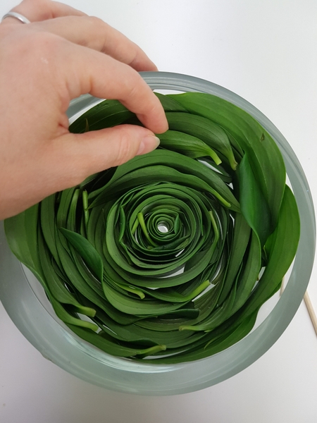 Fill any gaps by slipping in additional leaves Fill any gaps by slipping in additional leaves