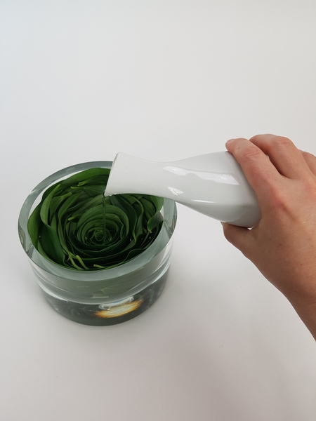Fill the container with water Fill the container with water