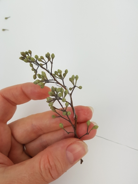 Place a second stem so that the stems overlap. Place a second stem so that the stems overlap.
