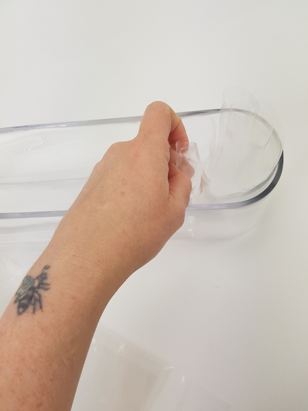 Place the cellophane in a container making sure it remains upright Place the cellophane in a container making sure it remains upright