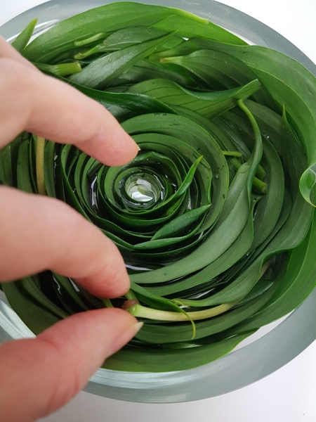 Slip in a few lily pistils to follow the spiral Slip in a few lily pistils to follow the spiral