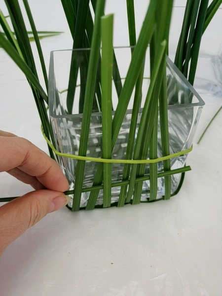 Weave in a horizontal blade of grass Weave in a horizontal blade of grass