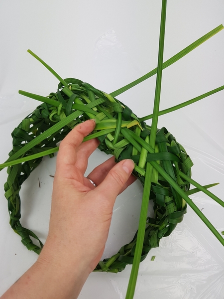 Fill in all the gaps by interweaving the grass through the grid Fill in all the gaps by interweaving the grass through the grid