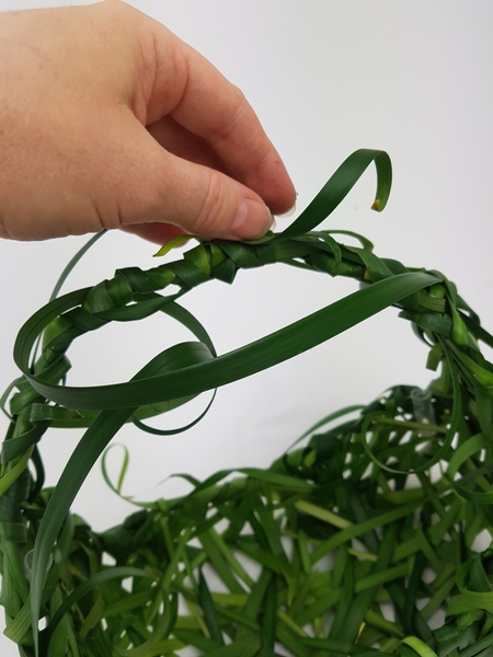 Glue in water tubes to keep the fresh flowers hydrated and add loose dangling blades of grass for a more natural look Glue in water tubes to keep the fresh flowers hydrated and add loose dangling blades of grass for a more natural look