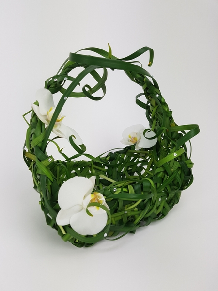 Phalaenopsis and lily grass basket Phalaenopsis and lily grass basket