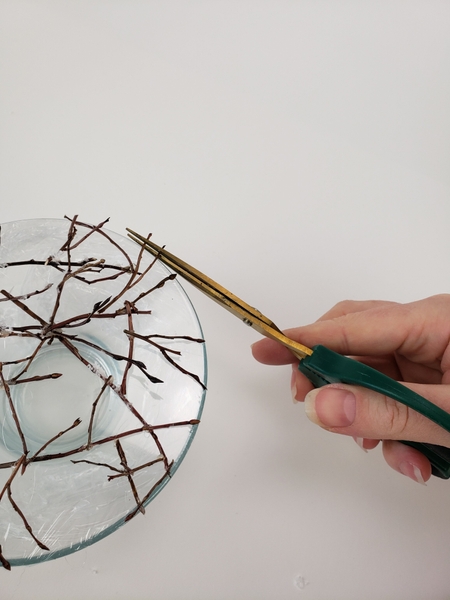 Snip away any twigs that are too long Snip away any twigs that are too long