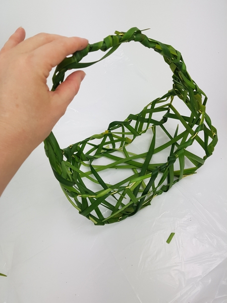 This creates a natural grid for you to weave the grass through This creates a natural grid for you to weave the grass through