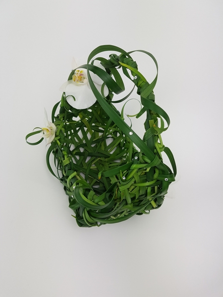 Weave a sturdy basket from grass floral design Weave a sturdy basket from grass floral design