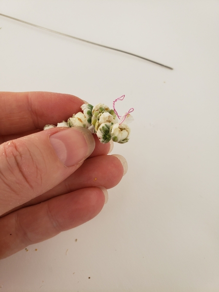Bend the wire to shape the blossom caterpillar Bend the wire to shape the blossom caterpillar