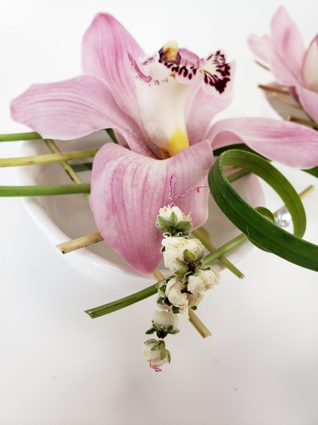 Spring floral design with a blossom critter Spring floral design with a blossom critter