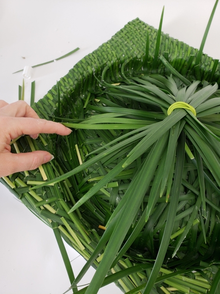 Add a the tips of the grass that you cut away back Add a the tips of the grass that you cut away back