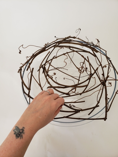 Continue to add twigs to create a full rose shape Continue to add twigs to create a full rose shape