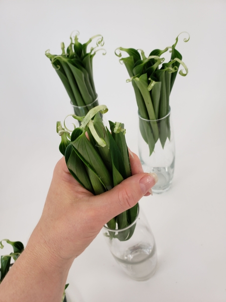 For my design I place the leaves in bud vases For my design I place the leaves in bud vases