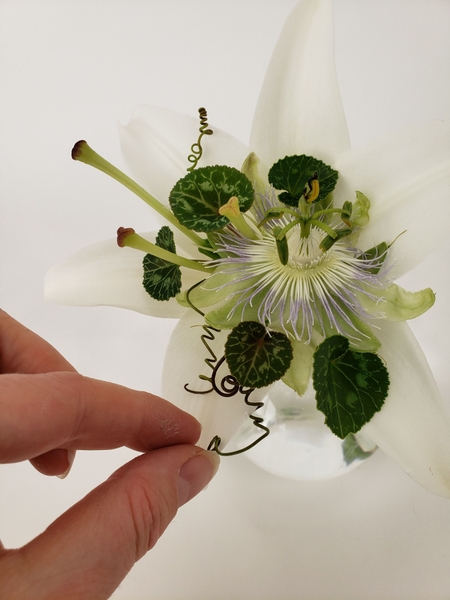 Lastly add a few whimsical tendrils Lastly add a few whimsical tendrils