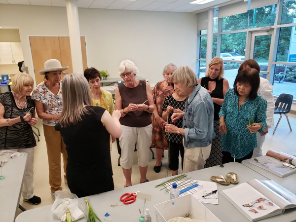 Capilano Flower Arrangers Meeting floral carpet workshop at the Delbrook community center.