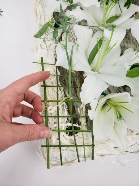 Creating a grid that keeps the plant material exactly where you want them. Creating a grid that keeps the plant material exactly where you want them.