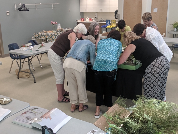 Floral designers collaborating Floral designers collaborating
