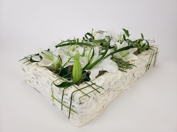 Using water tubes instead of floral foam in a low pave design Using water tubes instead of floral foam in a low pave design