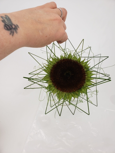 Overlap the grass to break the neat star pattern Overlap the grass to break the neat star pattern