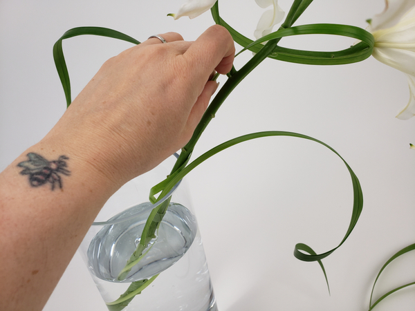 Place the flower stem in a vase