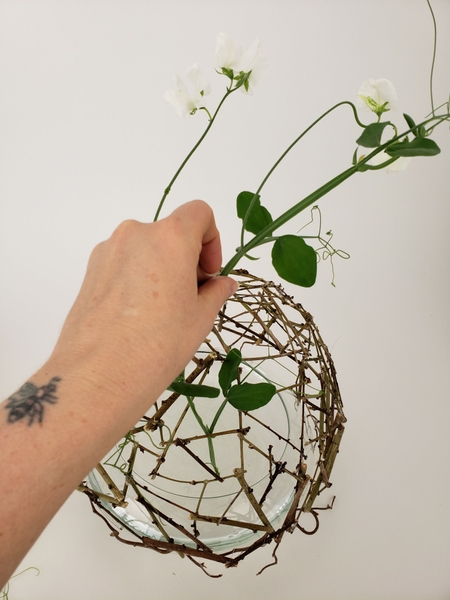 Place your flowers into the armature Place your flowers into the armature