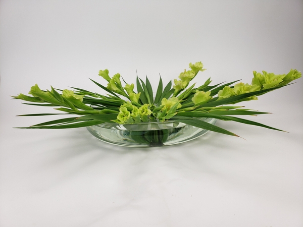 Gladiolus flower spikes in a foam free flower arrangement design Gladiolus flower spikes in a foam free flower arrangement design