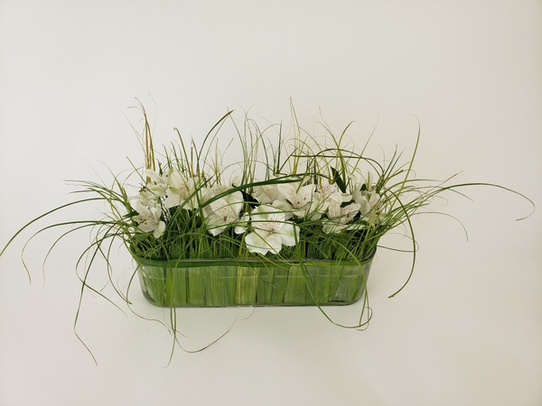 Luau inspired flower arrangement for a Hawaiian themed party