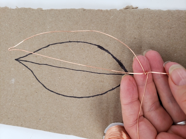 Twist the copper wire to secure it at the bottom Twist the copper wire to secure it at the bottom