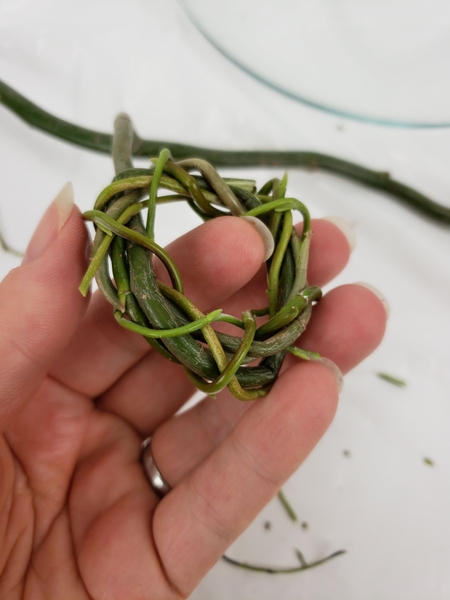 Weave the entire twig in on itself without cutting it from the main branch Weave the entire twig in on itself without cutting it from the main branch