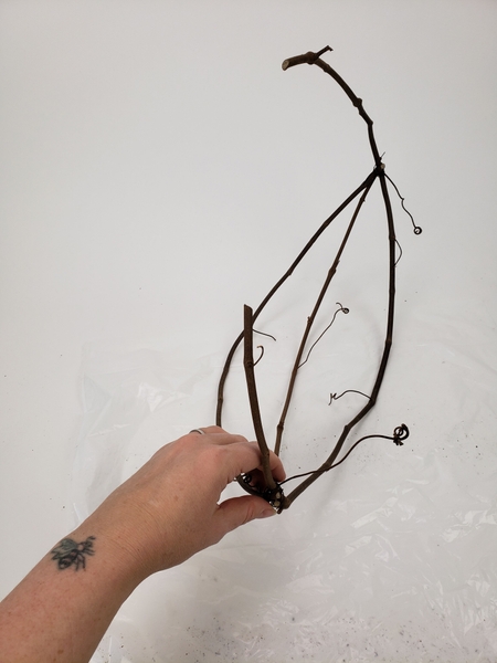 And wire the vine ends tightly together And wire the vine ends tightly together