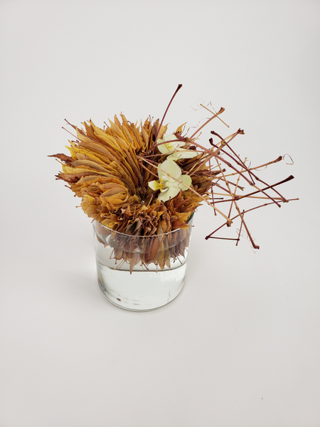 Thanksgiving table arrangement made from gathered fall leaves