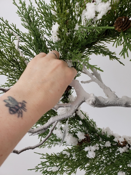 Add in a snow covered branch Add in a snow covered branch