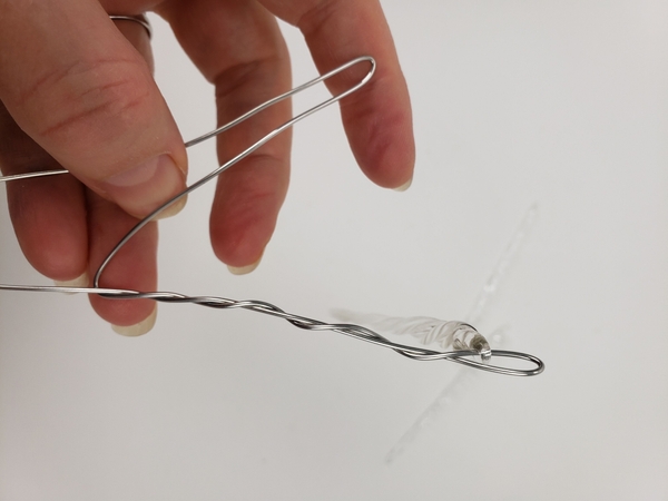 Bend the wire away from the twist Bend the wire away from the twist
