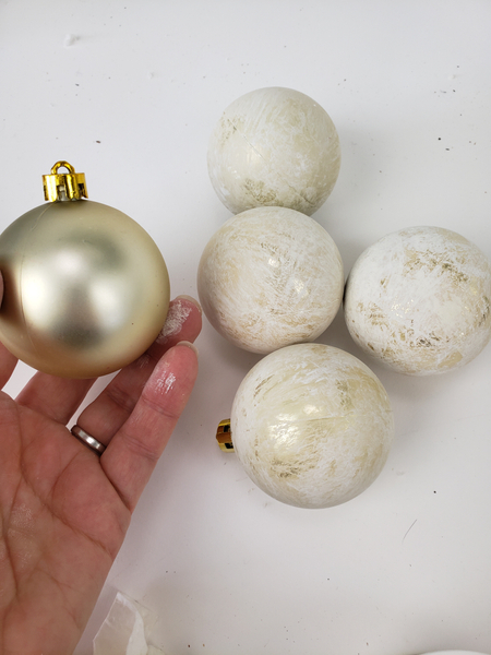 For my design I frosted gold baubles.
