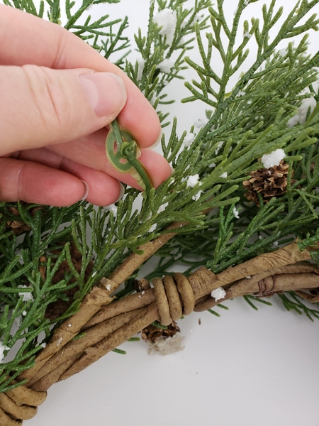 Give your wreath an inspection to remove any plastic bits Give your wreath an inspection to remove any plastic bits