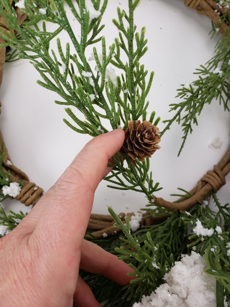 Inspect all the decorations that are already on to make sure they are in good condition Inspect all the decorations that are already on to make sure they are in good condition