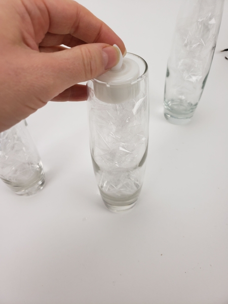 Measure the battery operated tealight to just fit into the vase. Measure the battery operated tealight to just fit into the vase.