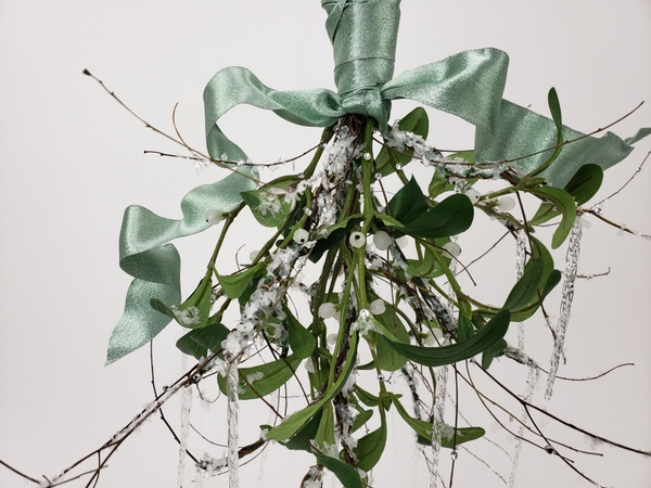 Mistletoe in a contemporary Christmas floral design Mistletoe in a contemporary Christmas floral design